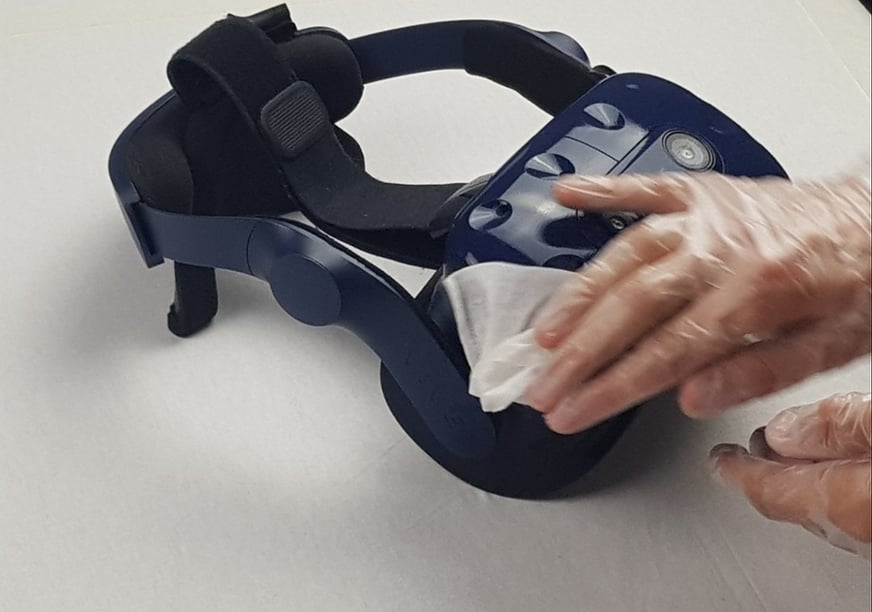 wipe your vr headset gently  wearing gloves  to clean it