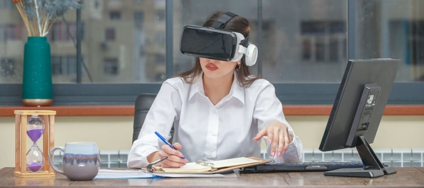 amazed-young-woman-wearing-vr-writing-min (1)-1-1