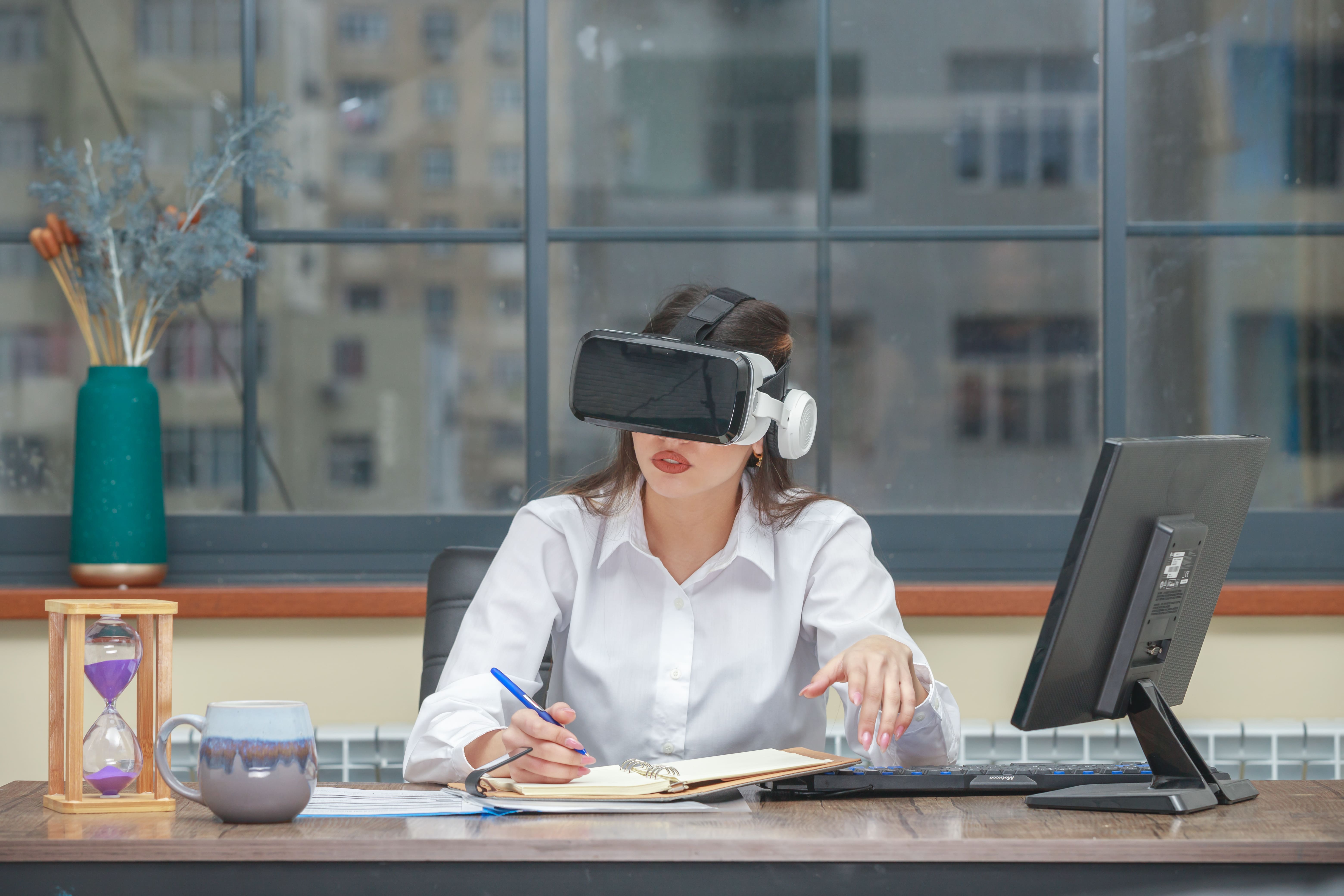 amazed-young-woman-wearing-vr-headset-working-remotely-in-a-vr-meeting-with-cloud-VR