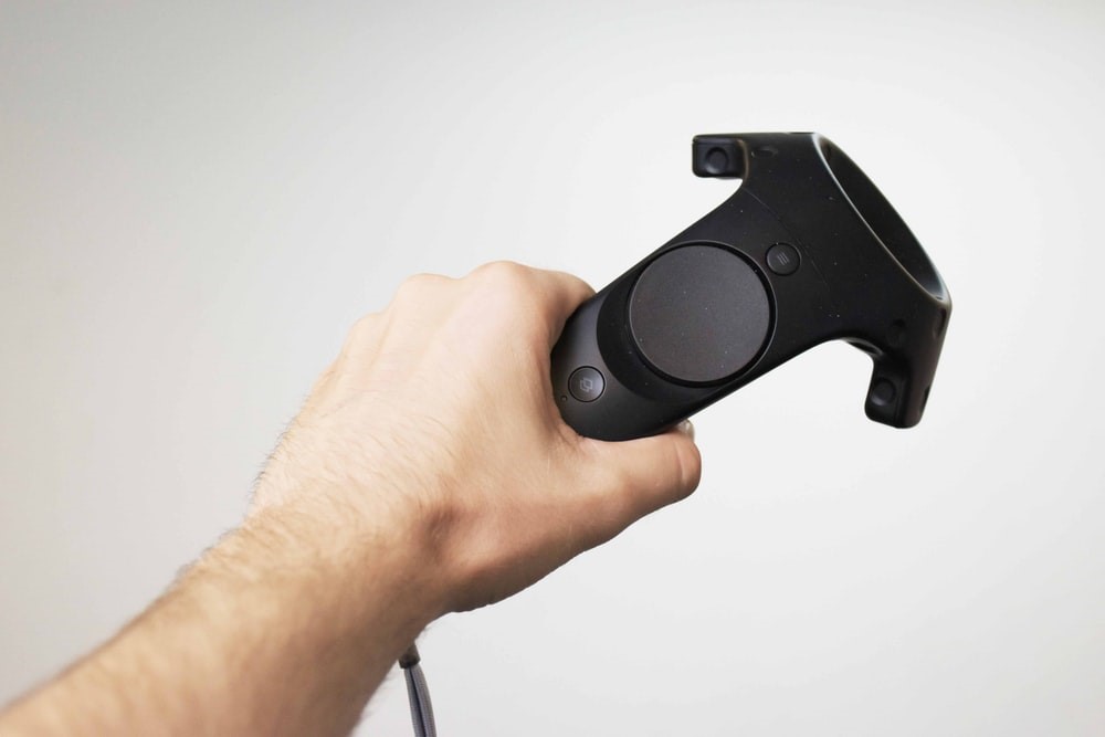 hand holding a VR controller