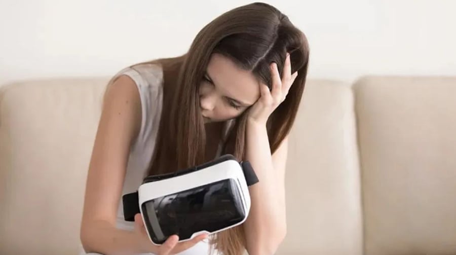 woman-with-symptoms-of-VR-motion-sickness